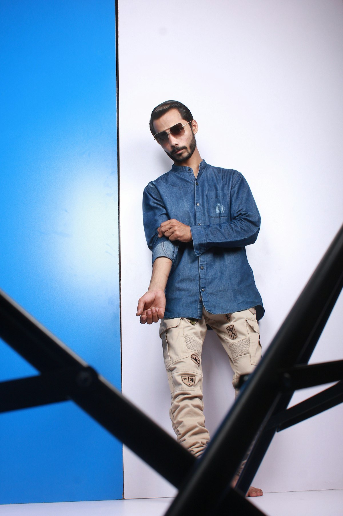 Man wearing raw indigo slim tapered selvedge jeans