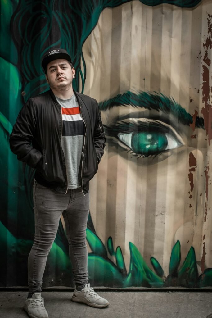 Man wearing jet black slim jeans
