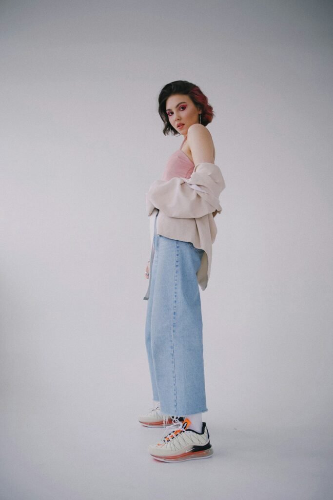 Woman in light wash high rise mom jeans